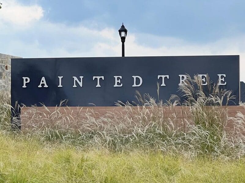 The entrance sign of the Painted Tree Community.