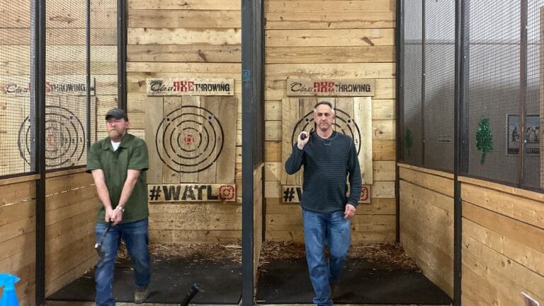 Calving and a team from Cardinal Strategies at an axe-throwing company.