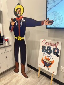 Big Tex cutout with Cardinal BBQ sign