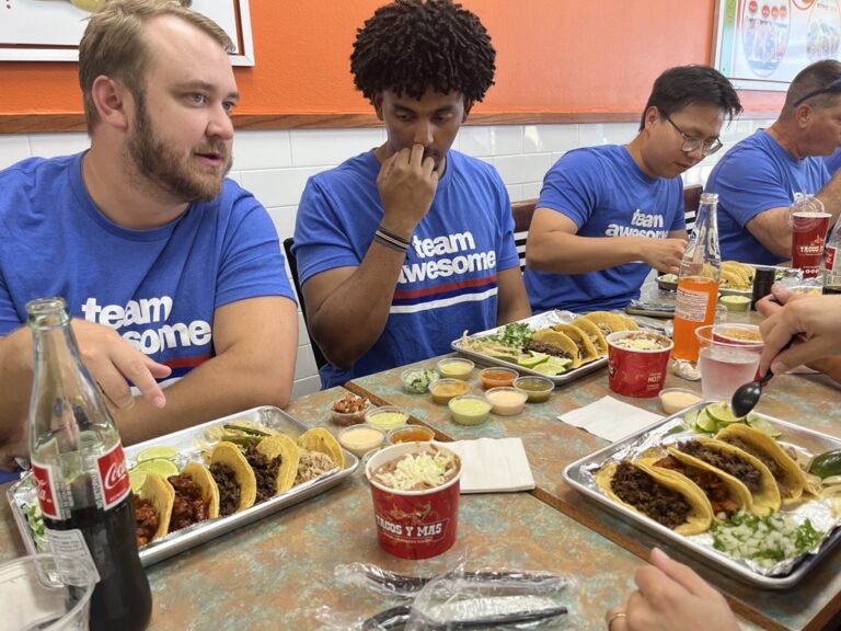 Intern, Malik, eating with Engineering team