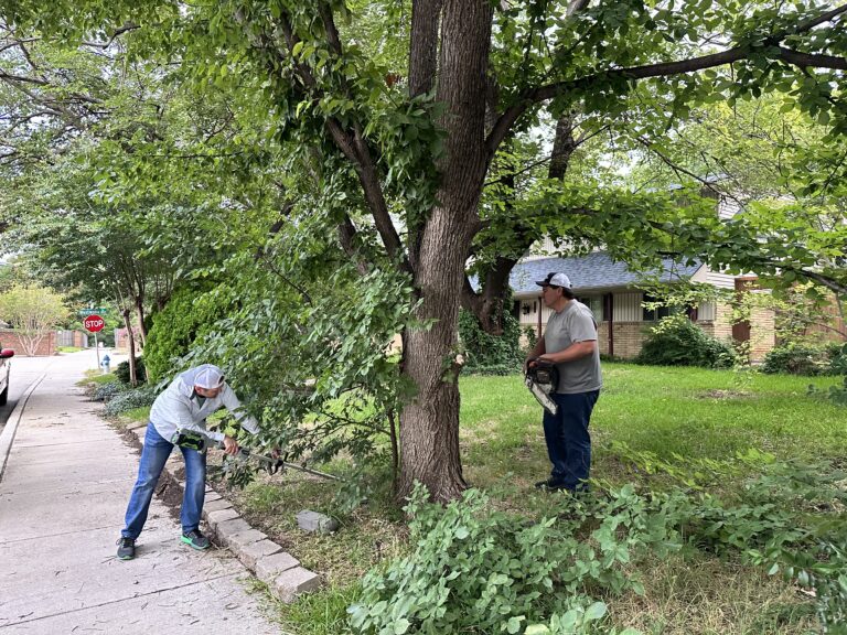 Cardinal Staff helping clean property
